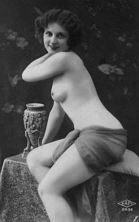 vintage lovely posing with a vase